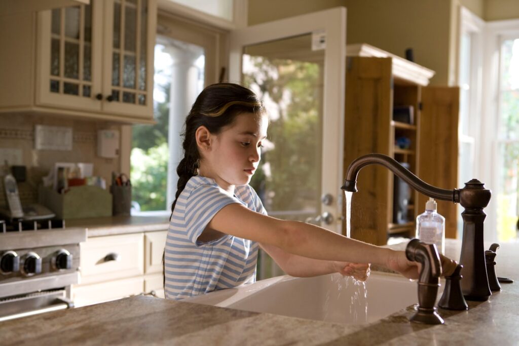 Child helping with chores